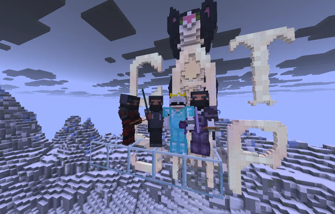 Four CatSMP players posing in front of the CatSMP statue at spawn
